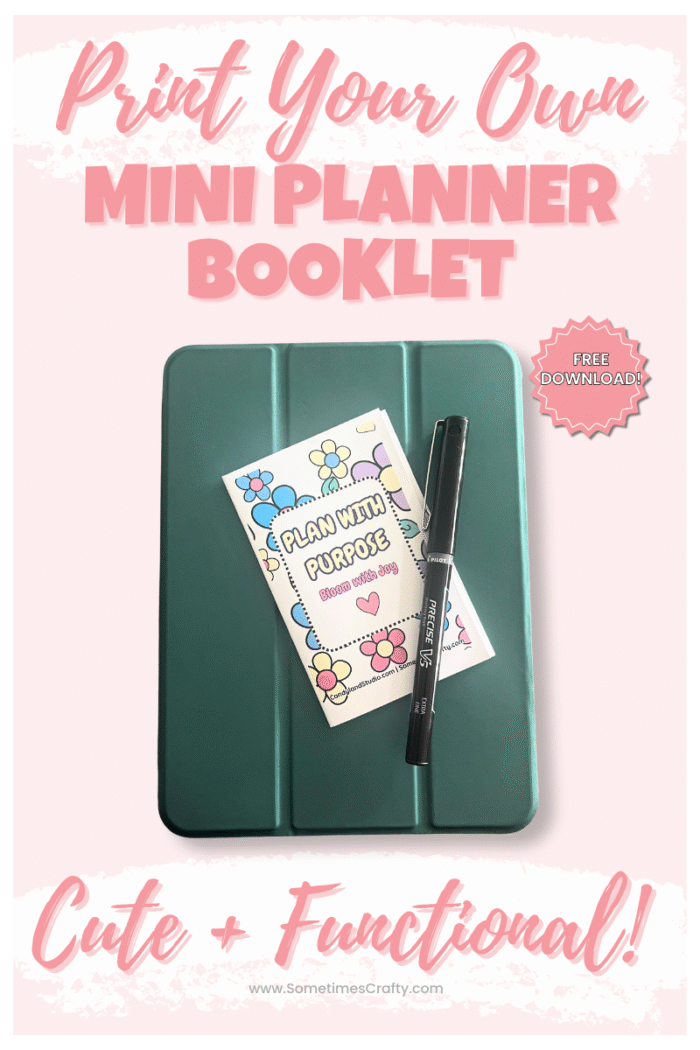 Vertical Pinterest image with a pink background featuring a free printable mini planner booklet titled "Plan With Purpose" resting on a teal tablet with a pen. Text reads “Print Your Own Mini Planner Booklet – Cute + Functional – Free Download” from SometimesCrafty.com.